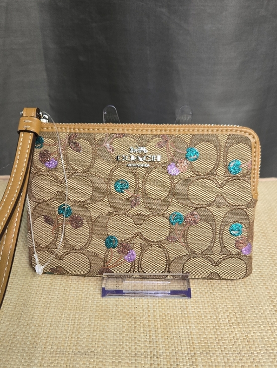 Coach Handbags - NWOT Coach Tan Signature Canvas Wristlet with Teal & Lilac Glitter Dots